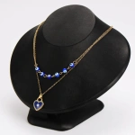 Ατσάλινο σετ με κολιέ με μπλε ματιά και σκουλαρίκια χρυσές μπίλιες - SET068 - Image 2