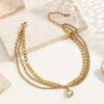 Βραχιόλι ποδιού χρυσό ατσάλι με τριπλή αλυσίδα και στρόγγυλο κρύσταλλο-AN075 - Image 2