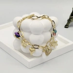 Βραχιόλι χρυσό ατσάλι με διάφορα charms-BR030 - Image 2